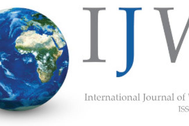 Logo of the International Journal of Wellbeing (IJW) showing Earth and the letters I, J, and W.